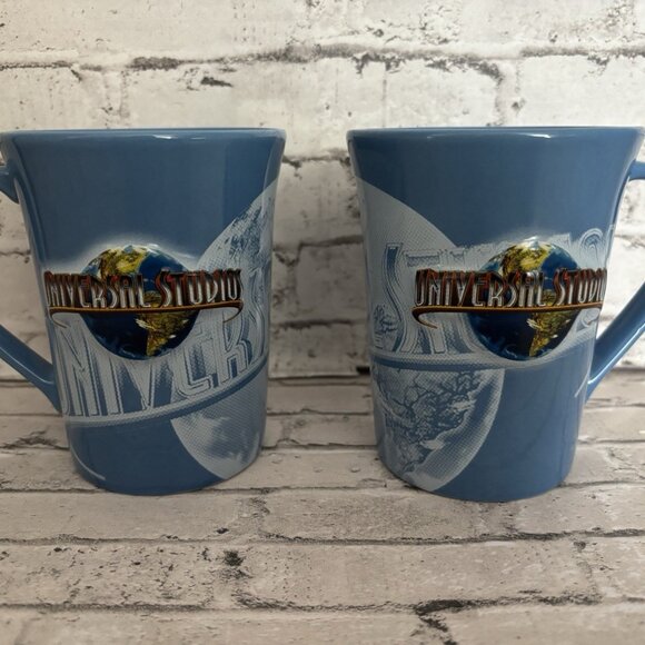 2009 Universal Studios Embossed Blue Ceramic Mug Lot Of 2 16oz - Picture 1 of 5